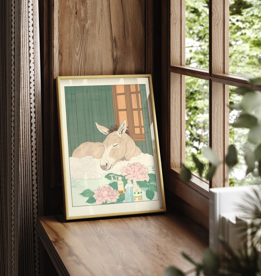 Framed donkey bathroom print with warm tones and botanical background