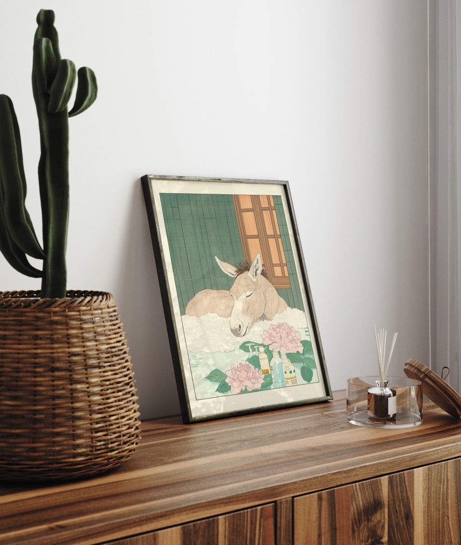 Framed bathroom decor featuring a peaceful donkey in a flower-filled Japanese-style bath