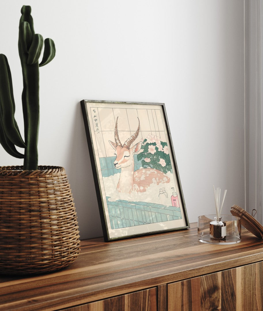 Framed bathroom decor featuring a peaceful gazelle in a flower-filled Japanese-style bath