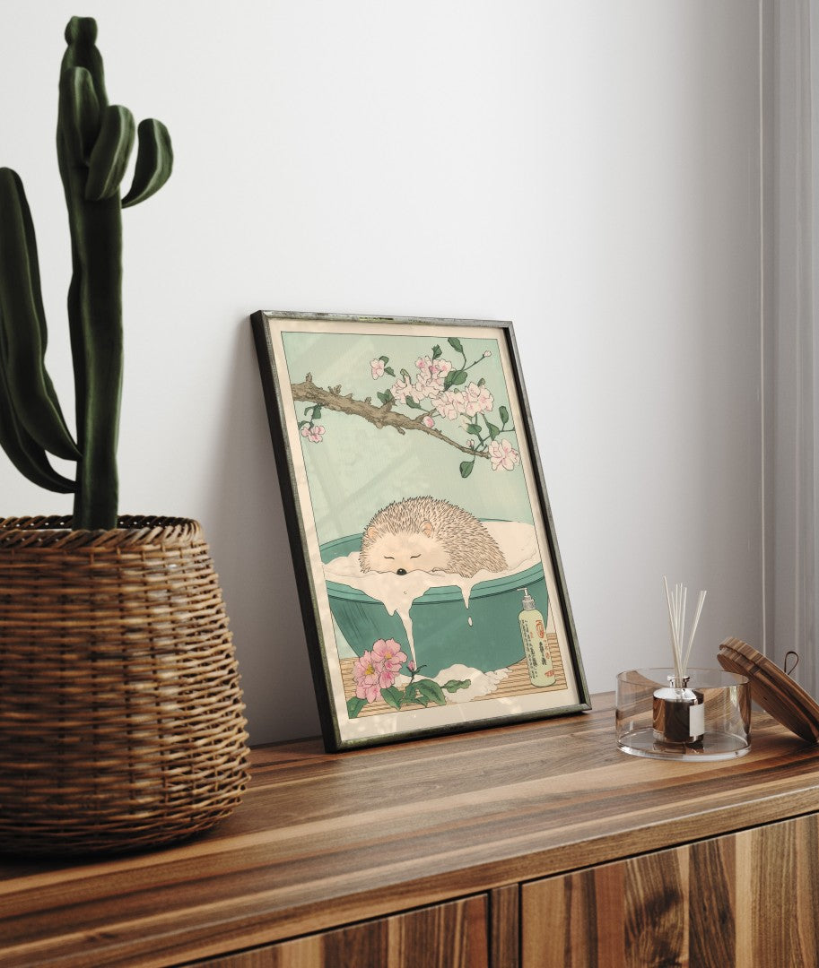 Framed bathroom decor featuring a relaxed hedgehog in a Japanese-style flower bath