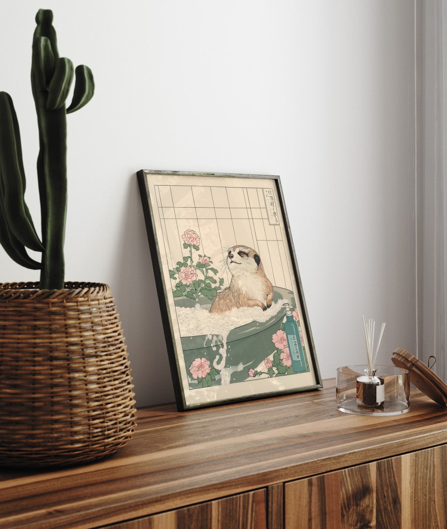 Framed bathroom decor featuring a relaxed meerkat in a Japanese-style flower bath