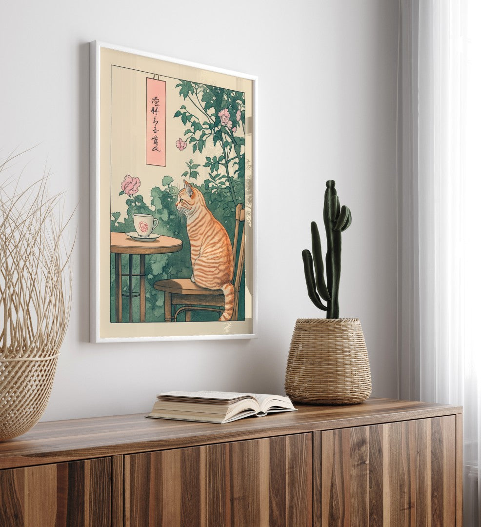 Framed cat artwork with tea cup, pink blossoms, and greenery
