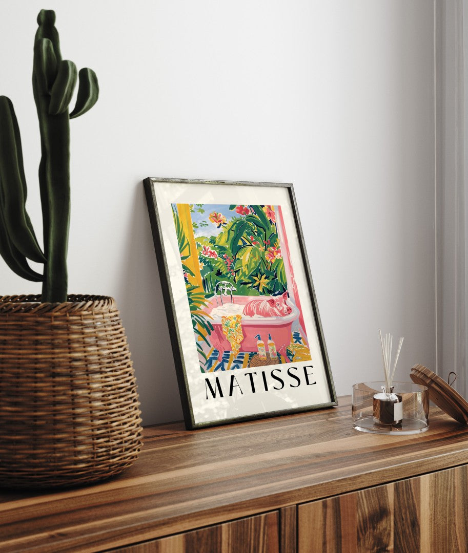 Framed Henri Matisse inspired art print featuring a pink pig relaxing in a bubble-filled tub with tropical greenery - bathroom wall art for decor