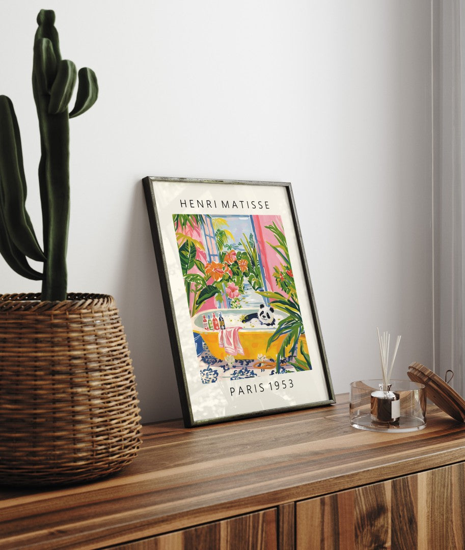 Framed Henri Matisse inspired print showing a playful panda in a lush bath scene.