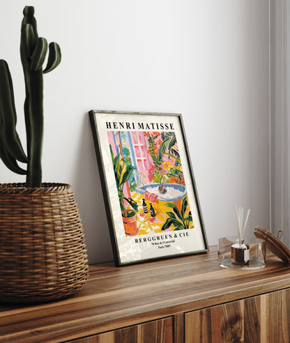 Henri Matisse bathroom wall art showing a rabbit relaxing in a lush, plant filled tub.