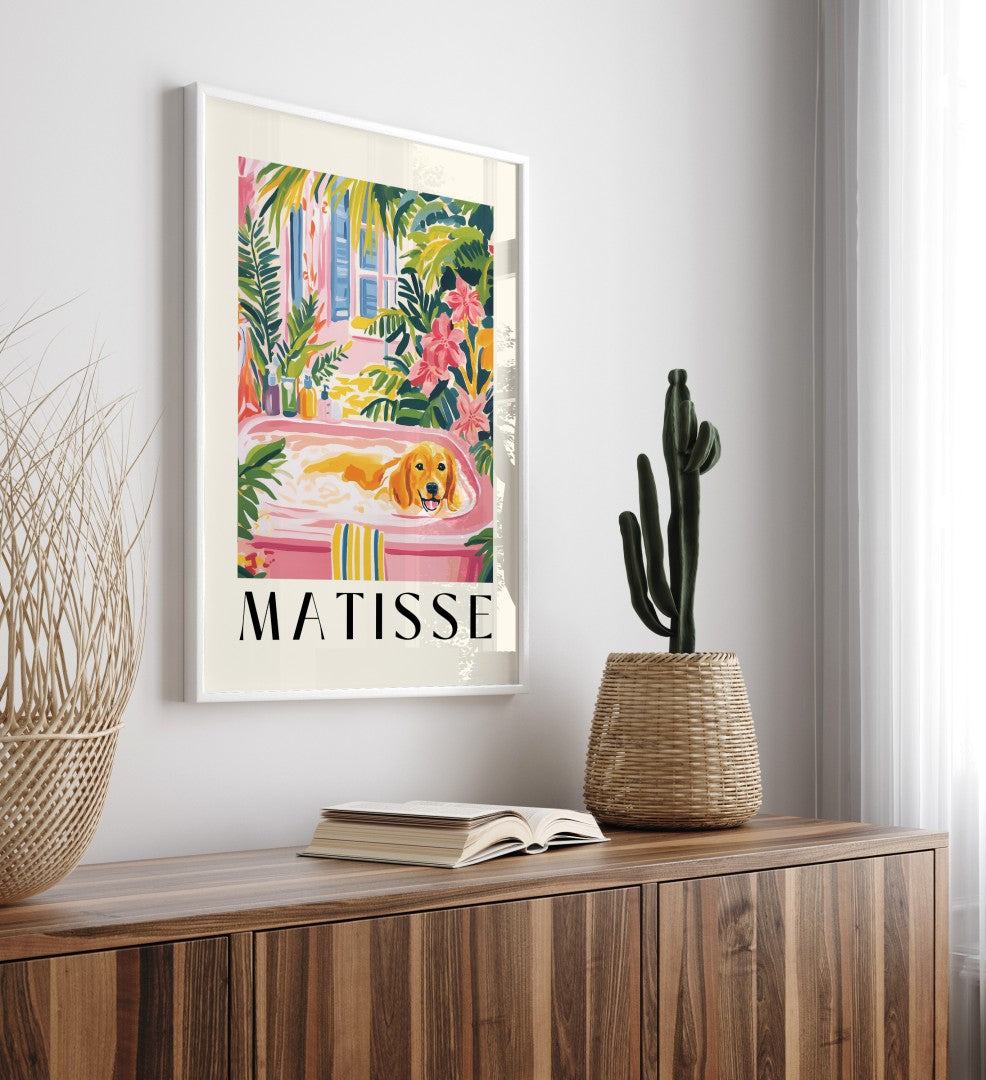 Framed Matisse style golden retriever wall art with pink tub and lush greenery.