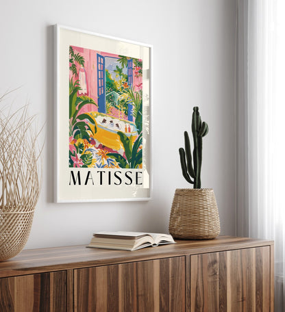 Whimsical framed wall art featuring rats in a golden tub with lush greenery.