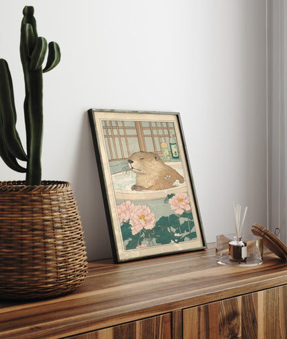 Framed bathroom decor featuring a relaxed beaver in a Japanese-style soak
