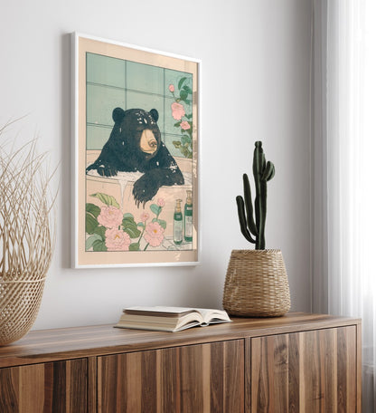 High-quality framed sun bear bathroom print with soft botanical background
