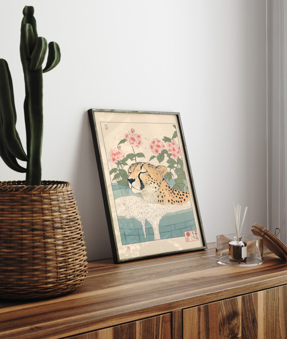 Framed bathroom decor featuring a relaxed cheetah in a Japanese-style flower bath