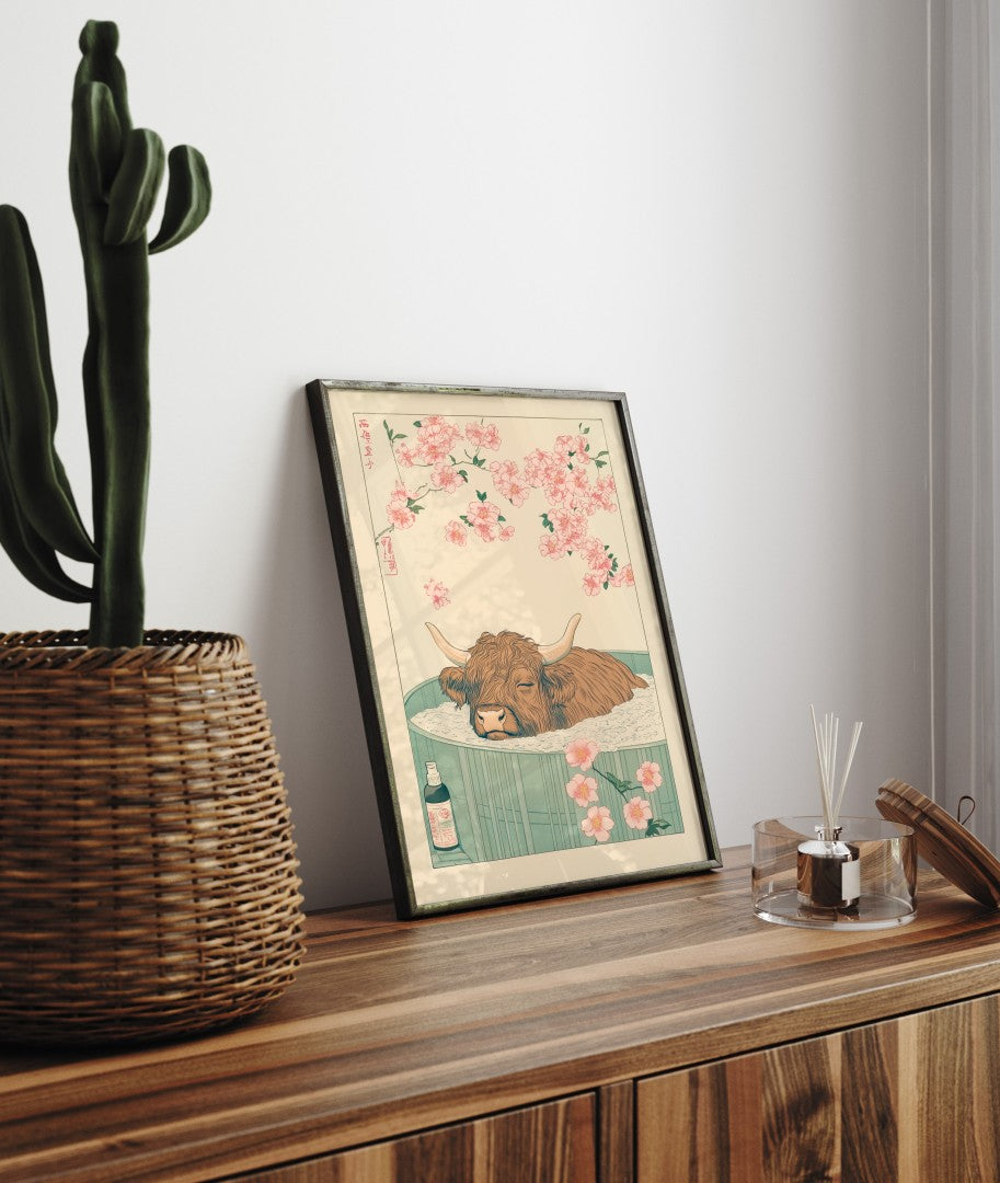 Framed bathroom decor showing a calm Highland cow in a Japanese-inspired bath