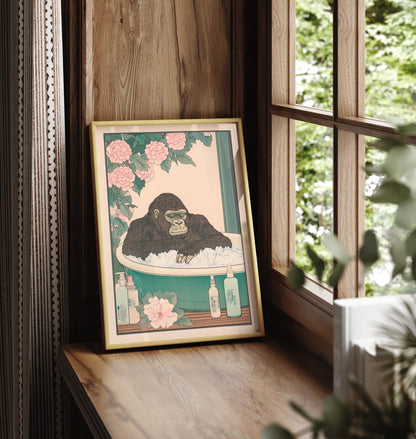 Framed gorilla bathroom print with natural background and gentle expression