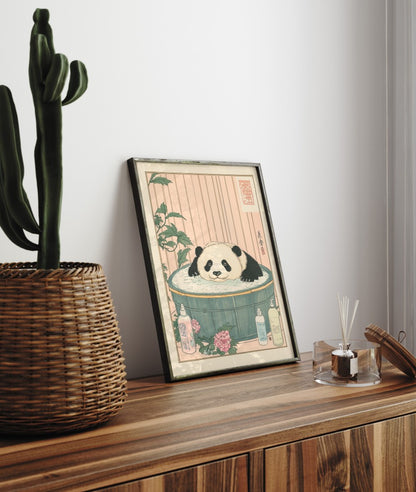 Framed bathroom decor showing a calm panda in a Japanese-style floral bath